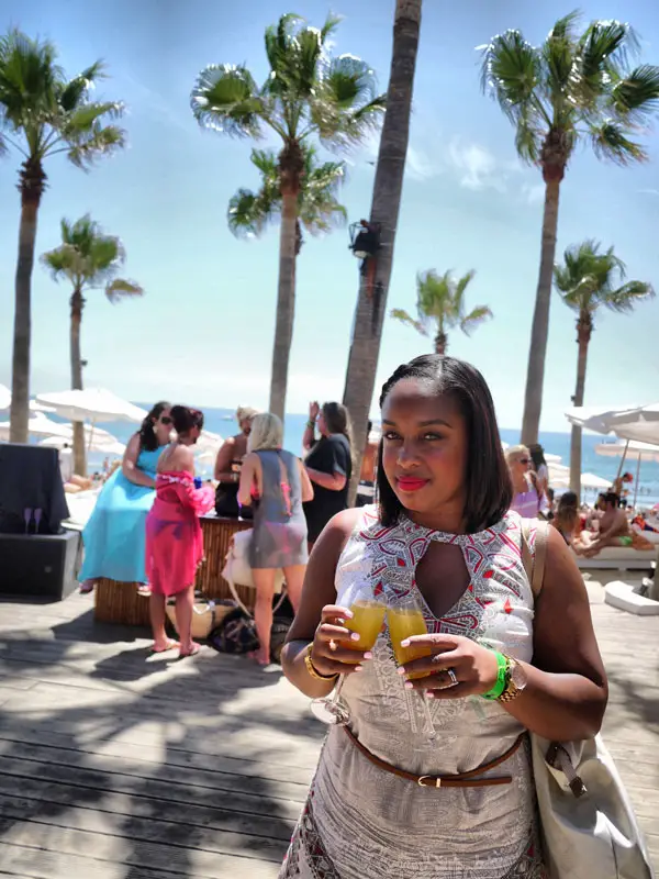 Nat With Two Drinks at Nikki Beach in Marbella, Spain