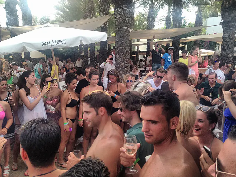 Red Indian on a Motorbike Riding Through the Crowd at Nikki Beach in Marbella