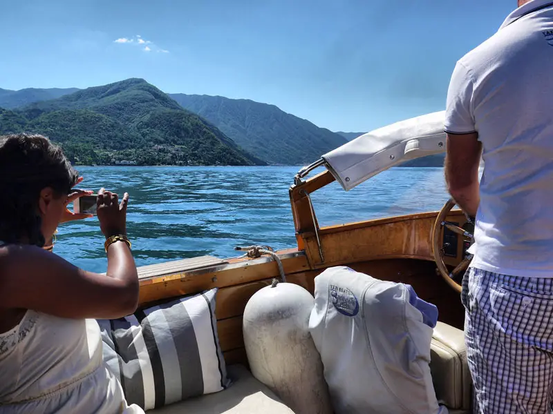 Nat Taking a Photo of Lake Como From the Boat