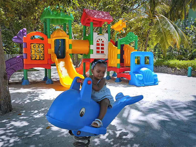 Our Daughter Layla: Thoroughly Enjoying the Outdoor Playground at Bandos Maldives' Kokko Kids Club