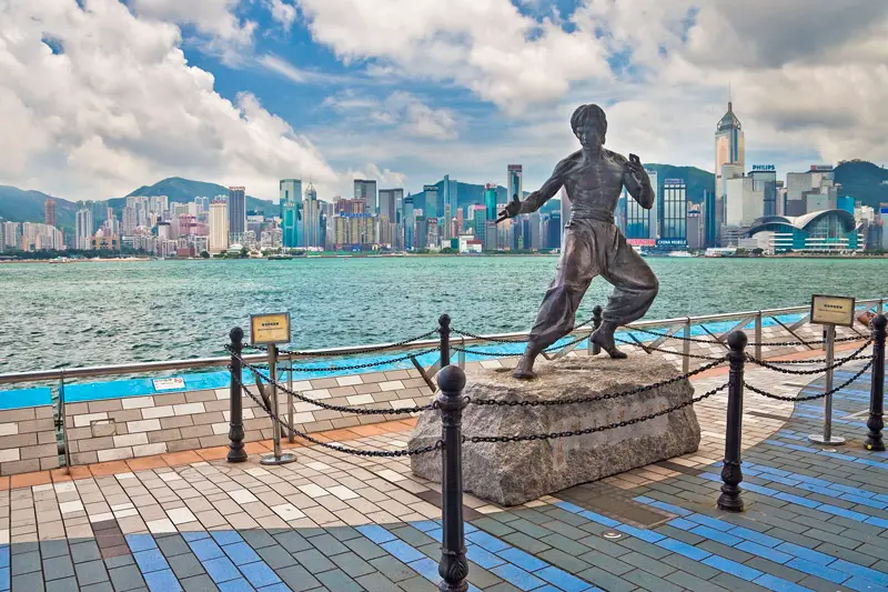 The Bronze Bruce Lee Statue on the Victoria Harbour Waterfront at the Avenue of Stars - Tsim Sha Tsui, Kowloon, Hong Kong