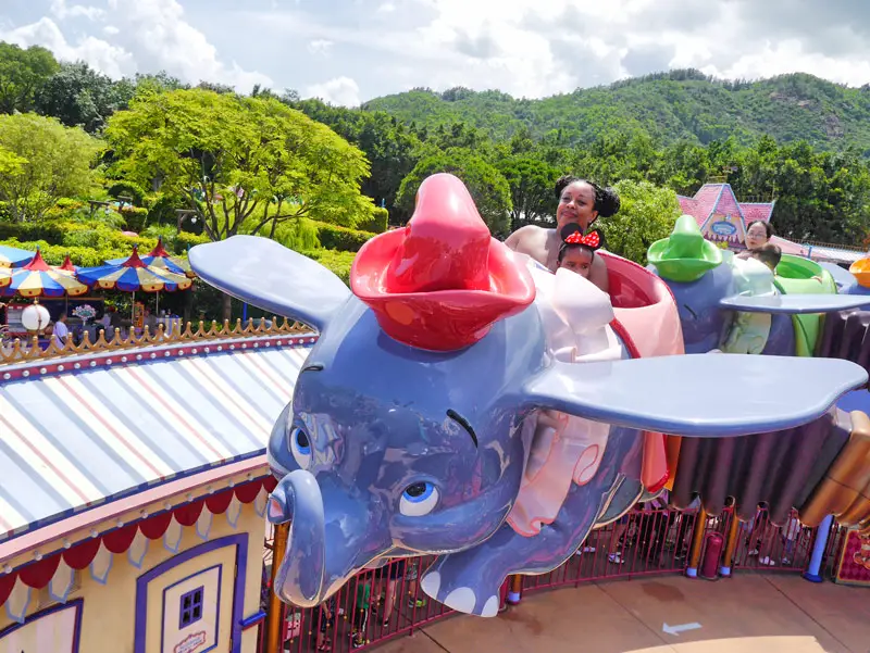 Nat and Layla - Happily Riding Dumbo the Flying Elephant. Just Look at Their Faces!