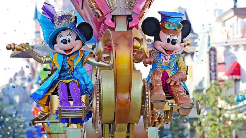 Minnie Mouse and Mickey Mouse Cycle Through Main Street USA in True Disneyland Parade Fashion