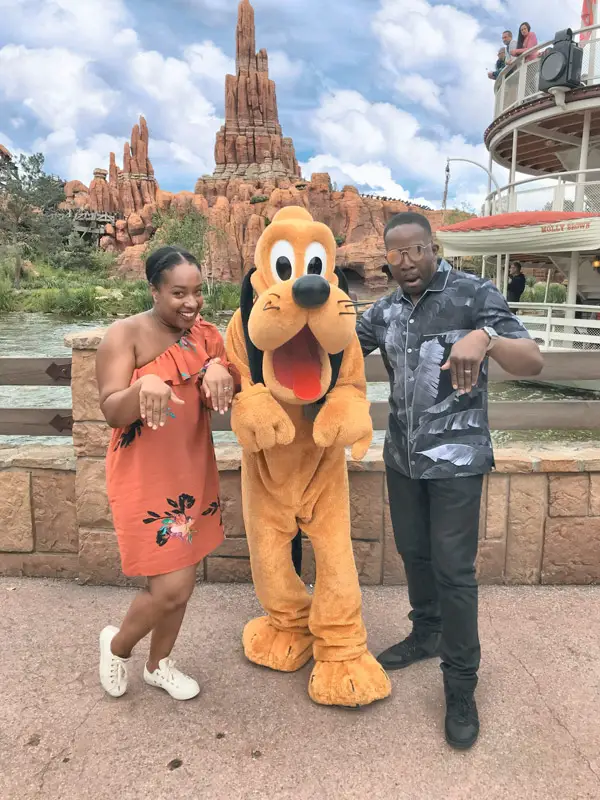 Posing for a Photo with Pluto at Disneyland Paris