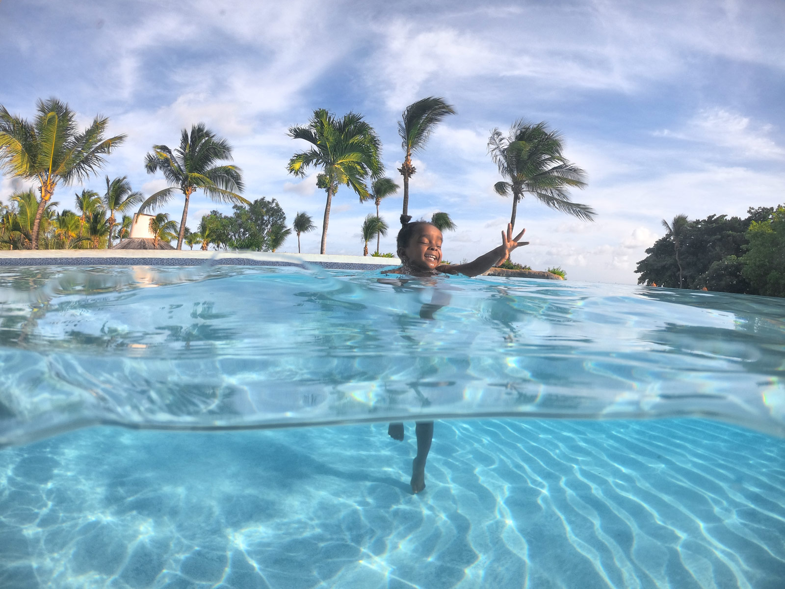 Girl in Swimming Pool at the Hilton Barbados Resort Hotel