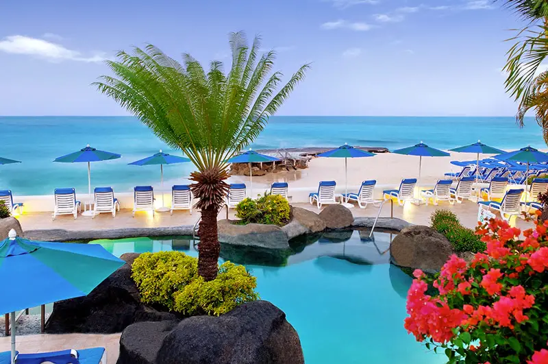 A Scenic Swimming Pool at Crystal Cove - Overlooking a White Sand Beach on Barbados' Platinum Coast