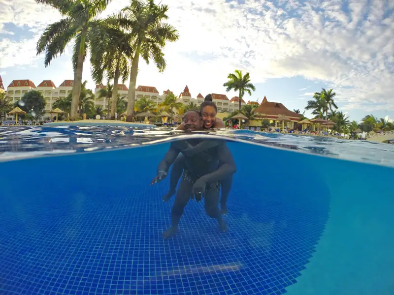 Nat and Mase in Jamaica's Bahia Principe Grande Swimming Pool