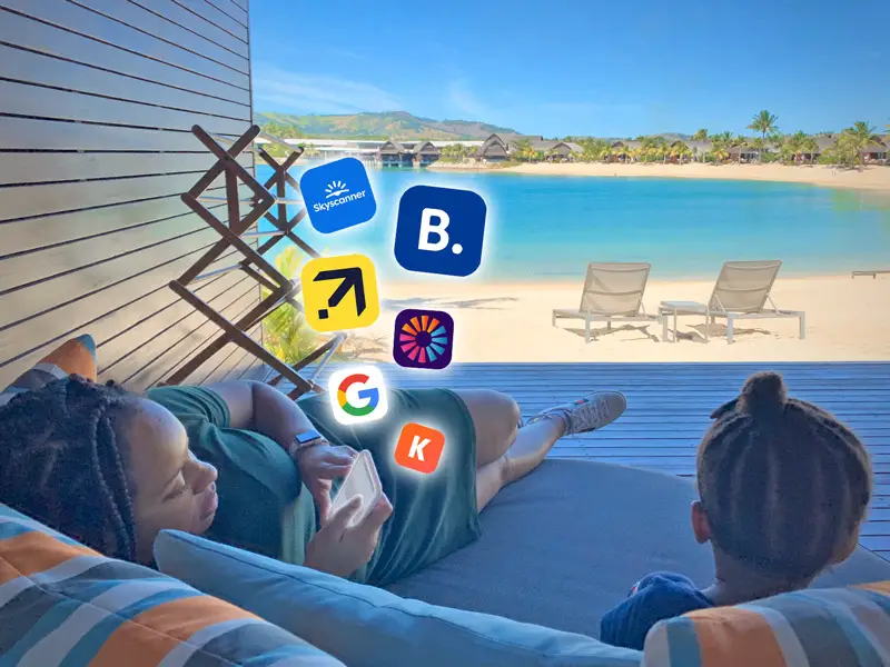 Family on a Tropical Beach on Smartphone Booking a Vacation/Holiday