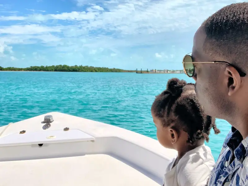 Mase and Our Daughter on Private Boat Cruise in Turks and Caicos to Iguana Island