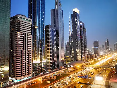 See Sheikh Zayed Road’s Bright Lights at Night