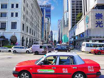 Stand by and Watch as Urban Taxis Whizz Through Tsim Sha Tsui