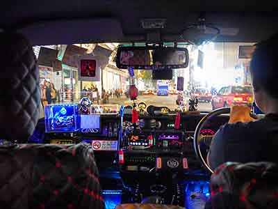 Hail a Ride in the Funkiest, Most Colourful Taxi in Hong Kong