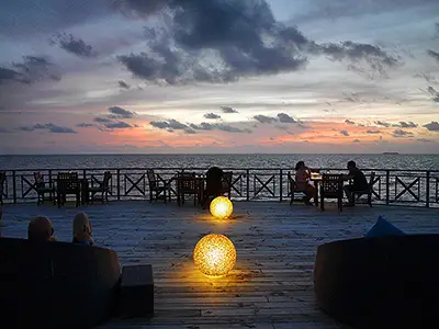 Enjoy Cocktails & Pink Sunsets at Huvan