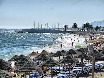 Bajadilla Beach: Relax Under an Umbrella