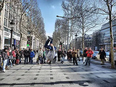 See Street Dancers Backflipping on Champs-Elysées