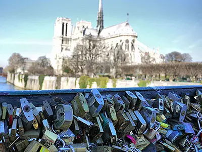 Put Love Locks on Pont des Arts Bridge