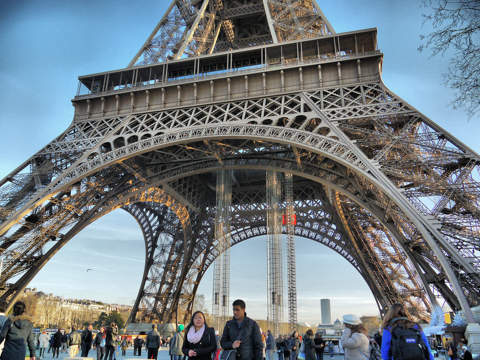 Strolling Beneath the Iconic Eiffel Tower Paris.