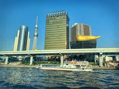 See the Asahi Golden Flame on the Sumida River